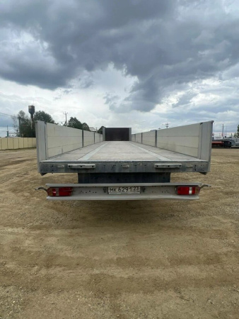 Grunwald 9453 Полуприцеп бортовой 9453-0000010-10 — Б/У, 2023 г.