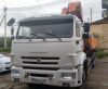 КАМАЗ 65115 6x4 Бортовой с КМУ — Б/У, 2023 г.