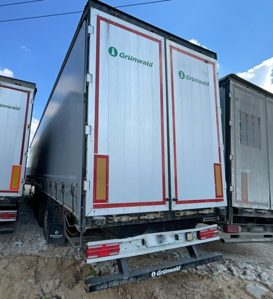 GRUNWALD 9453-0000010-10 Полуприцеп шторный/бортовой — Б/У, 2024 г.