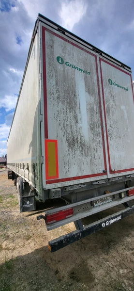 Grunwald 9453 Полуприцеп бортовой 9453-0000010-10 — Б/У, 2023 г.