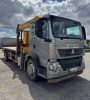 HOWO ZZ5167JSQM561GE1 с КМУ XCMG SQS157RU-8 — Б/У, 2023 г.