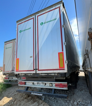 GRUNWALD 9453-0000010-10 Полуприцеп шторный/бортовой — Б/У, 2024 г.