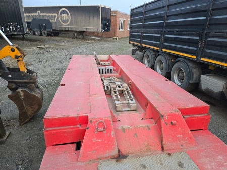 Спецприцеп 9942 Полуприцеп тяжеловоз 4 оси 994294-05 — Б/У, 2024 г.