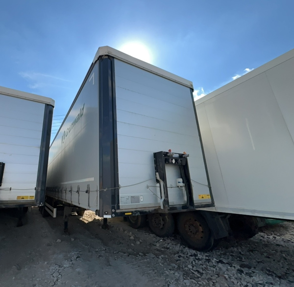 GRUNWALD 9453-0000010-10 Полуприцеп шторный/бортовой — Б/У, 2024 г.