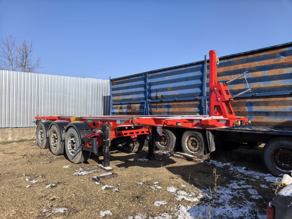 GRUNWALD 9453-0000010-30 Полуприцеп контейнеровоз 3 оси — Б/У, 2023 г.