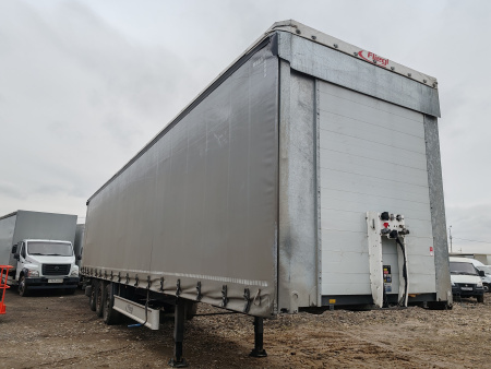 Fliegl SDS 350 Полуприцеп шторный для перевозки опасных грузов — Б/У, 2024 г.