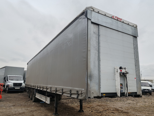 Fliegl SDS 350 Полуприцеп шторный для перевозки опасных грузов — Б/У, 2024 г.