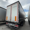 GRUNWALD 9453-0000010-10 Полуприцеп шторный/бортовой — Б/У, 2023 г.