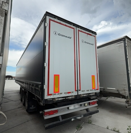 GRUNWALD 9453-0000010-10 Полуприцеп шторный/бортовой — Б/У, 2023 г.