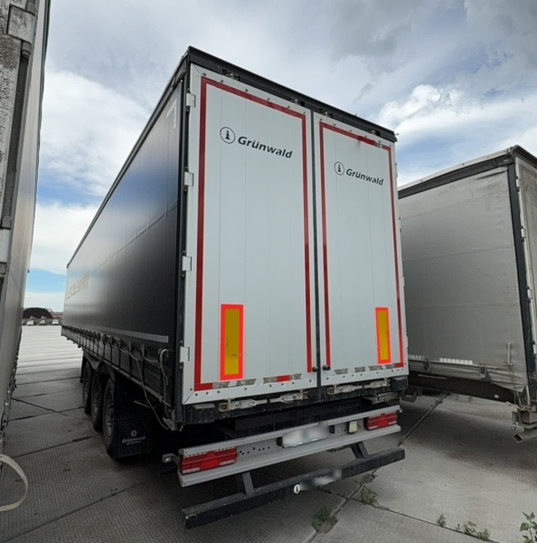 GRUNWALD 9453-0000010-10 Полуприцеп шторный/бортовой — Б/У, 2023 г.