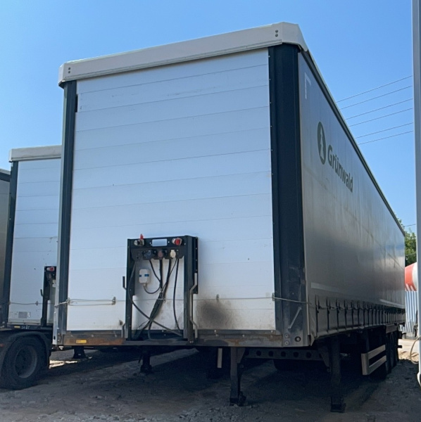 GRUNWALD 9453-0000010-10 Полуприцеп шторный/бортовой — Б/У, 2024 г.